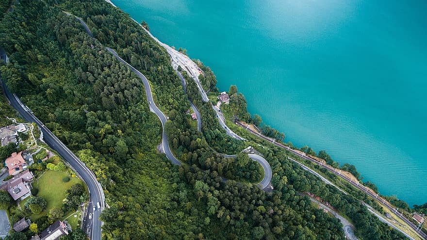 aerial-view-winding-road-ocean-water-aerial-landscape-drone-vertical-countryside-high.jpg