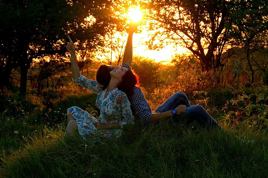 couple-love-sunset-grass-romance-in-the-evening.jpg