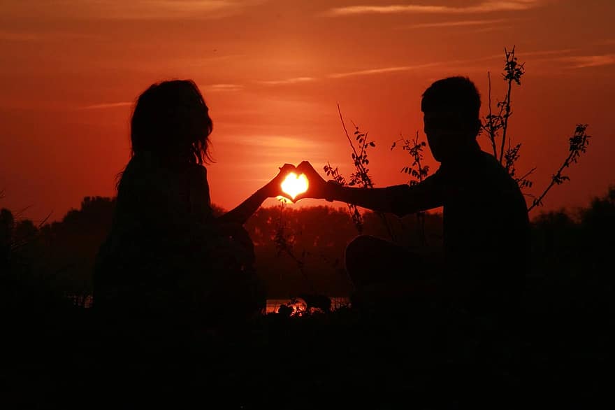 couple-love-sunset-water-sun-shadow-romance-in-the-evening.jpg