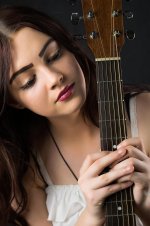 woman-beautiful-young-fashion-pretty-guitar-music-it-feels-like-mood.jpg